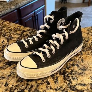 Size 9.5 black all star chuck taylor’s.